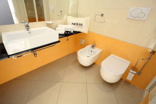 Фото Noha Suite Hotel