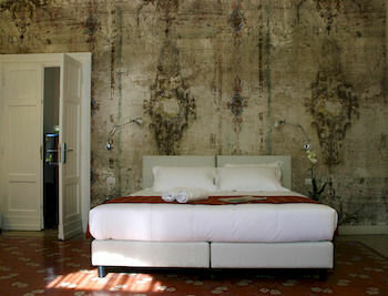 Фото Suites Farnese Design Hotel