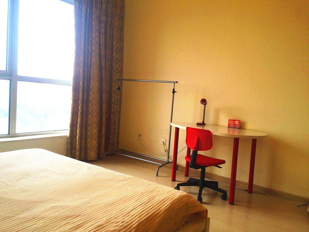 Фото China Sunshine Apartment Dacheng International