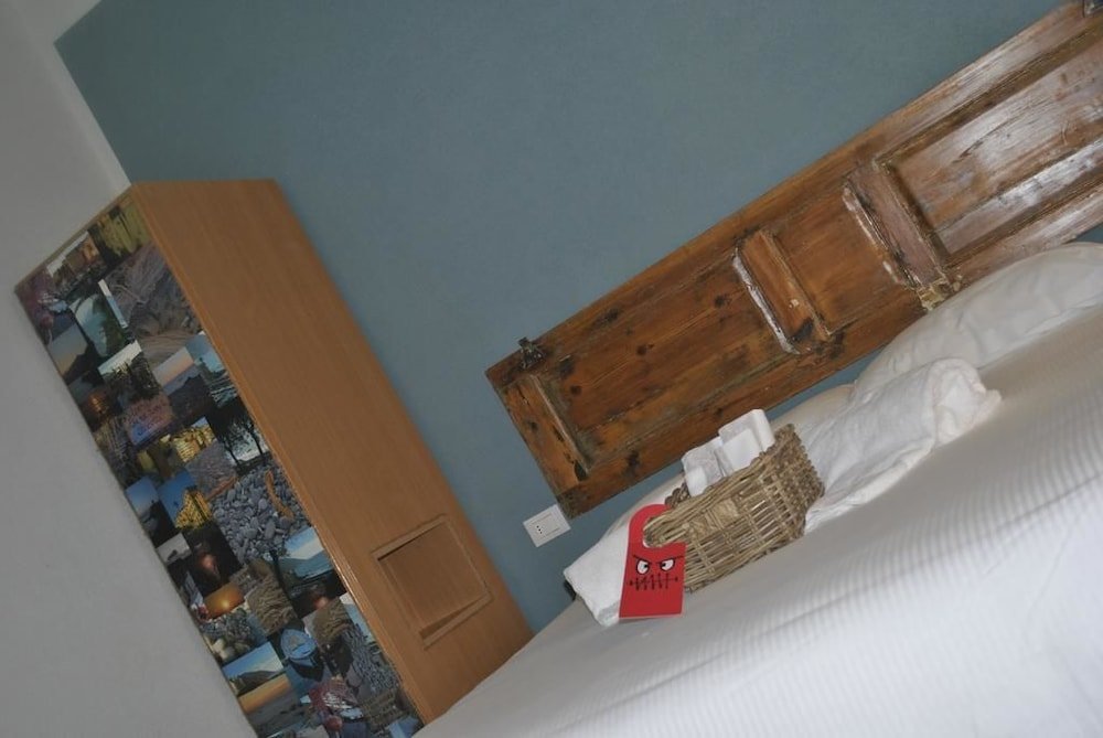 Фото Al Piccolo Scoglio - Room & Breakfast