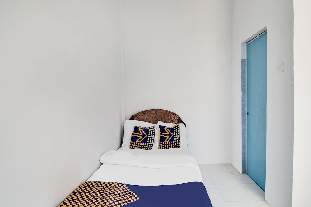 Фото Spot On 91858 Raja Homestay Syariah