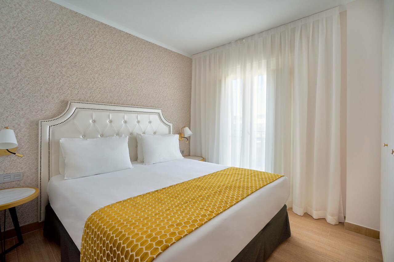 Фото Tandem Soho Suites