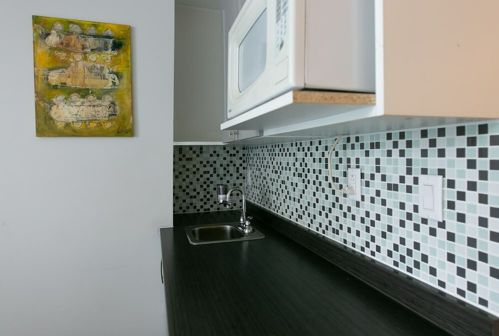 Фото Auberge & Hôtel Montréal Espace Confort