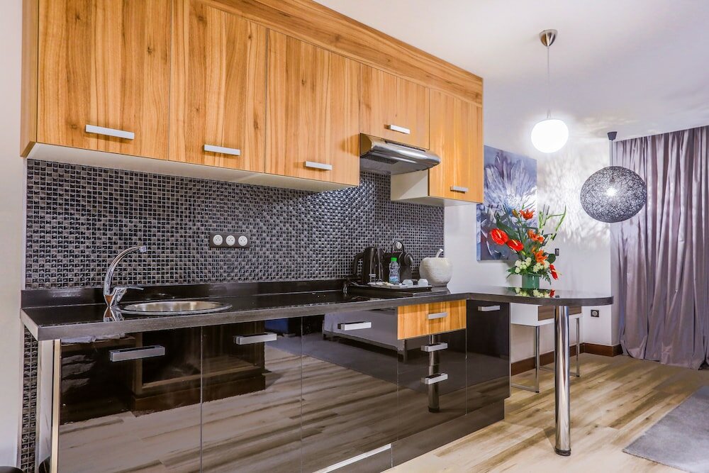 Фото Sbn Suites Hotel