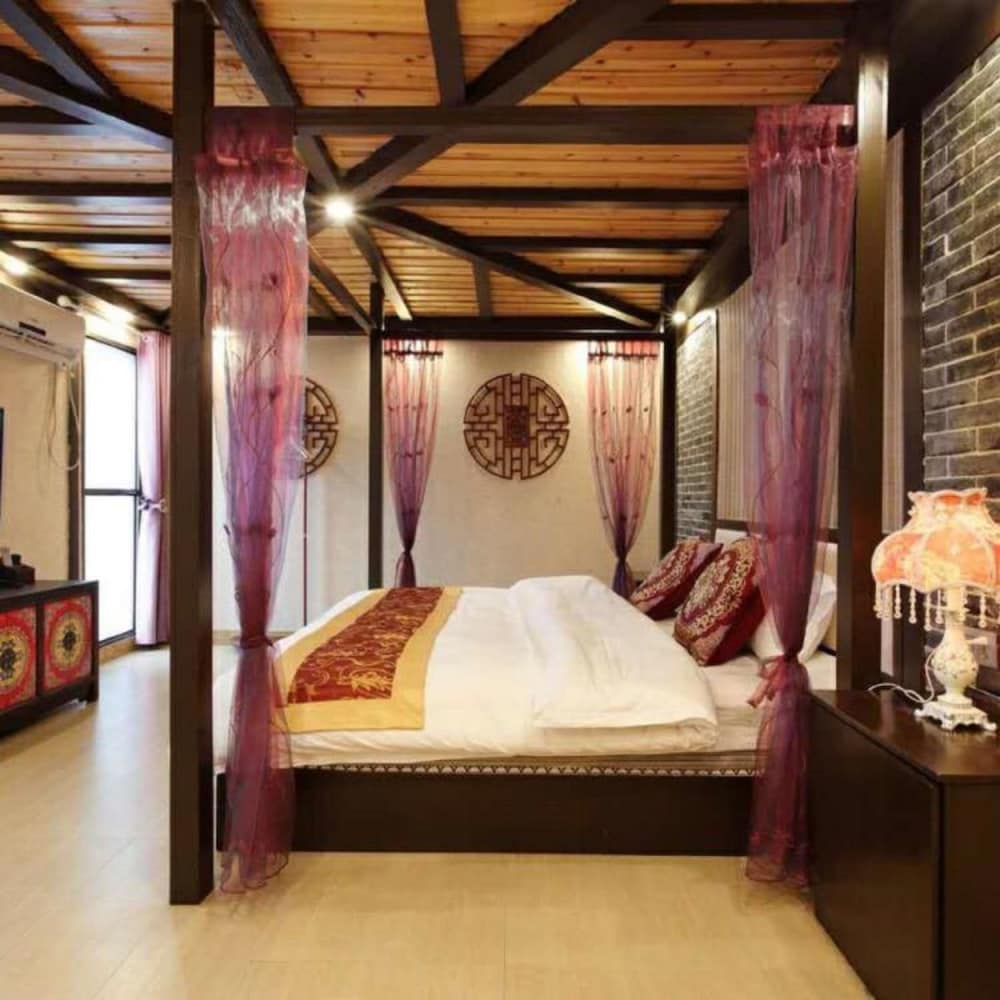 Фото Fenghuang Nanmu Inn No. 1