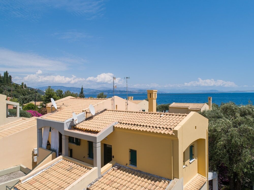 Фото Barbati Bay Elegant Apartments