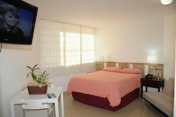 Фото Aparta Hotel Plaza del Sol