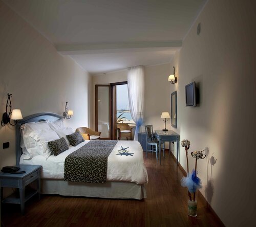 Внешний вид отеля Hotel Mira Spiaggia в Сан-Вито-Ло-Капо, фото 2