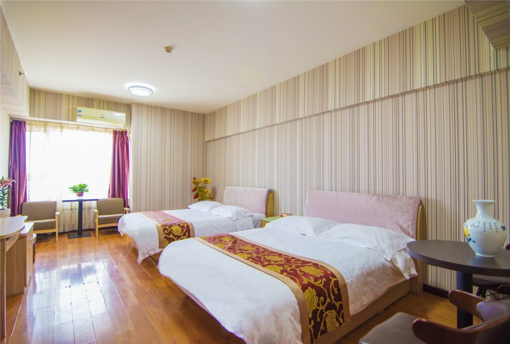 Фото Xian Golden Tree Business Hotel