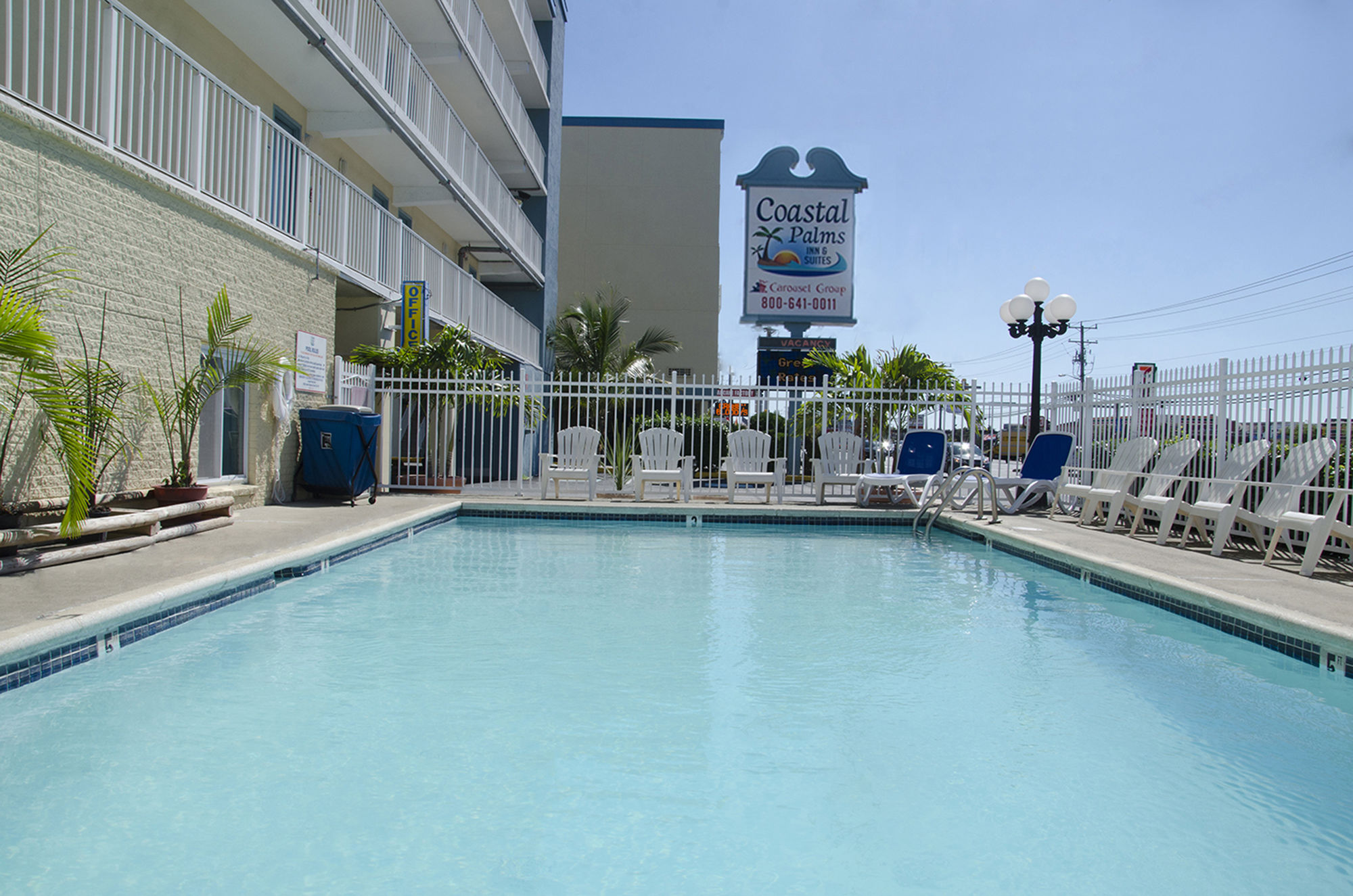 Фото Coastal Palms Inn & Suites
