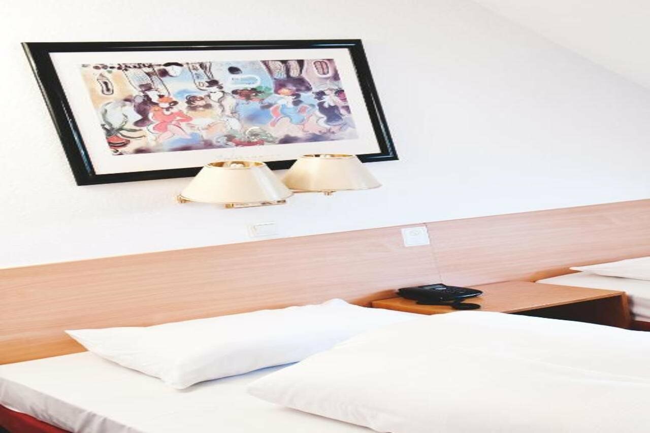 Фото Rheinmetropole Hotel