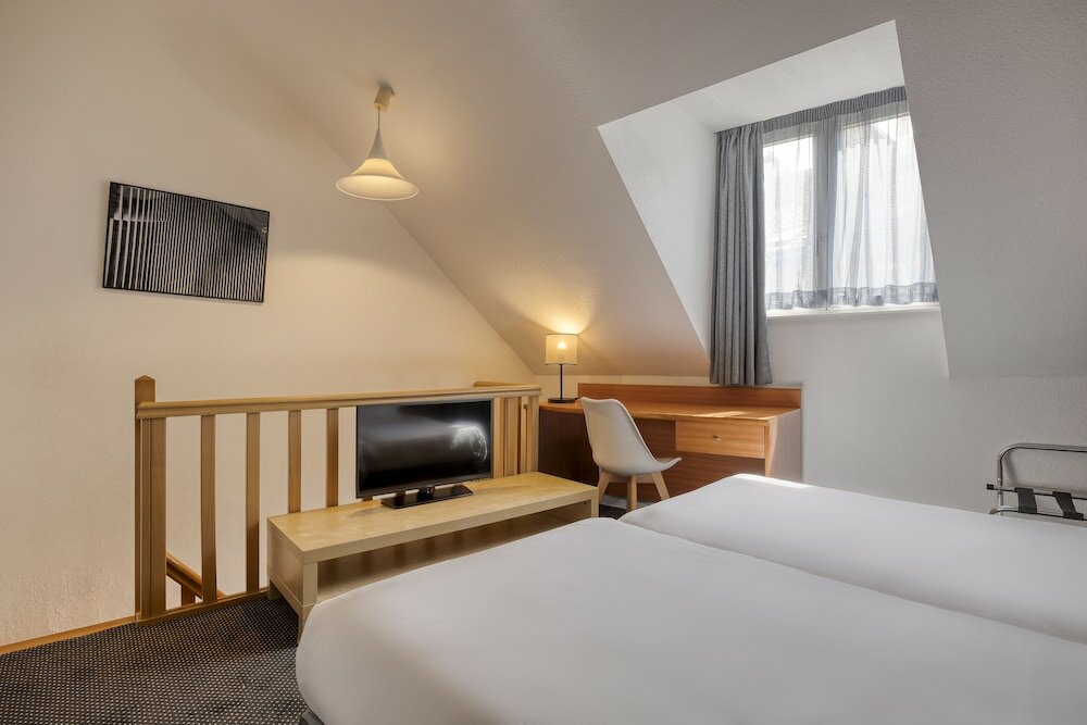 Фото Aris Grand-Place Hotel