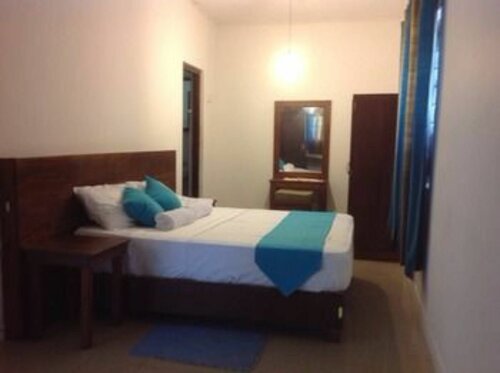 Гостиница Tree Breeze Inn в Канди