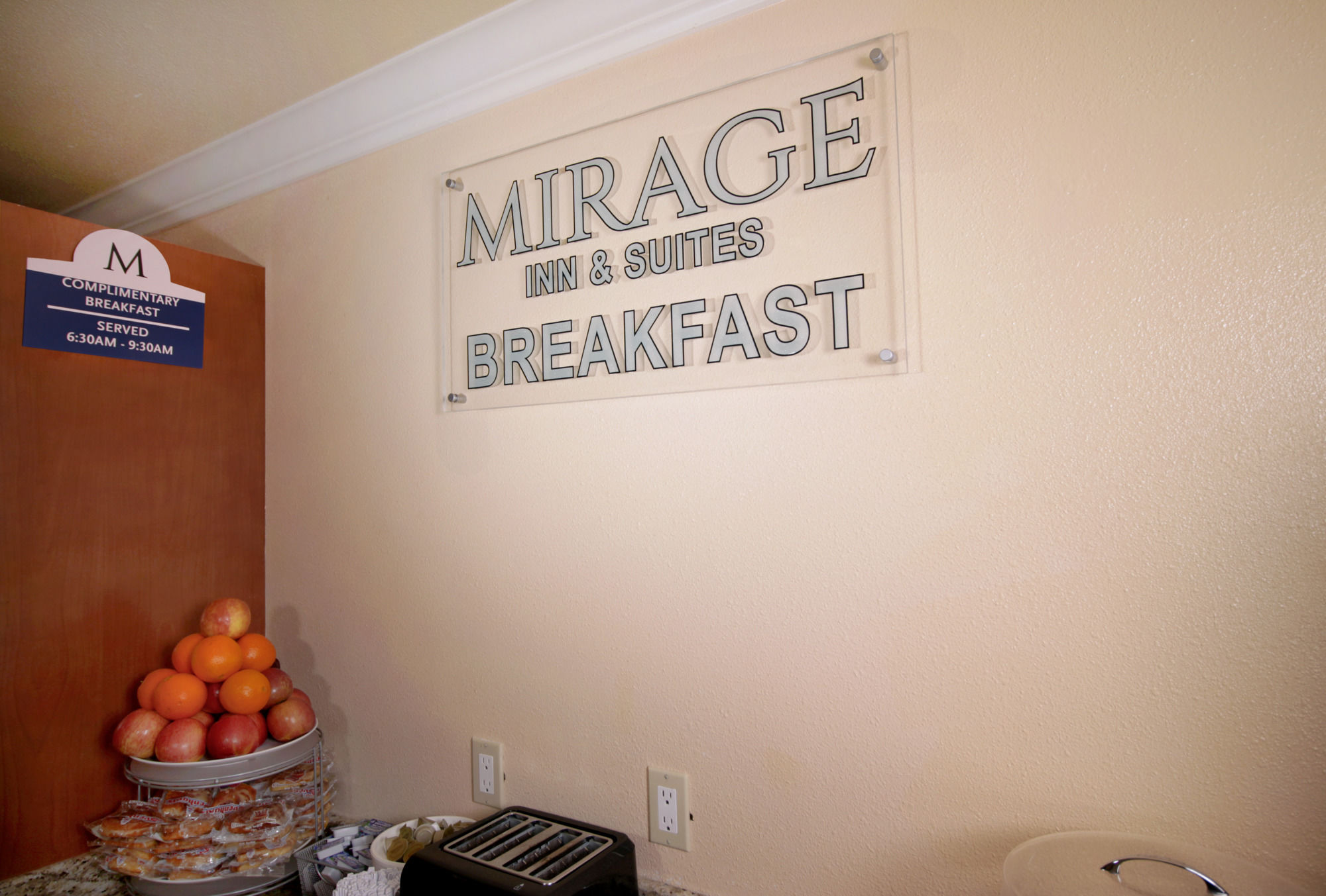 Фото Mirage Inn and Suites