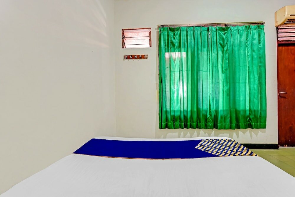 Фото Spot On 90098 Anak Mama Guesthouse