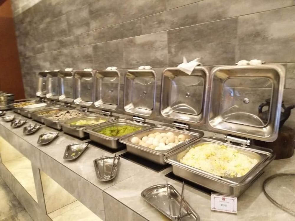 Фото Ramada Encore DaochengYading