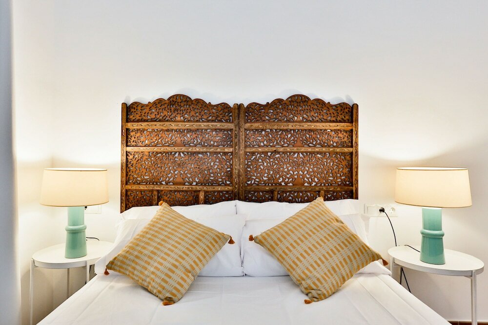 Фото Apartamentos Puerta Sevilla De Cordoba