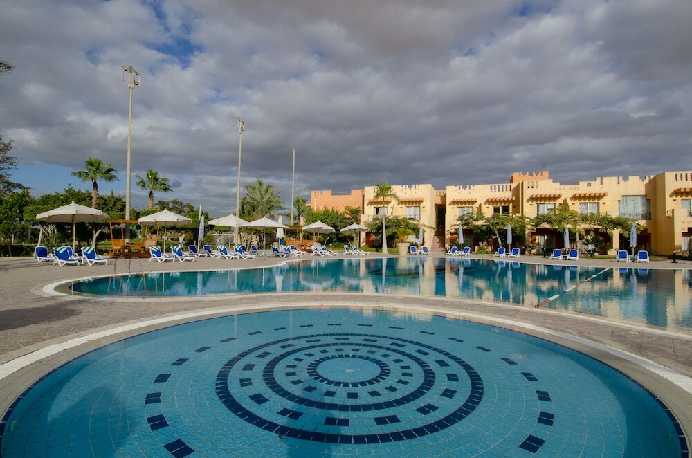 Фото Swiss Inn Pyramids Golf Resort