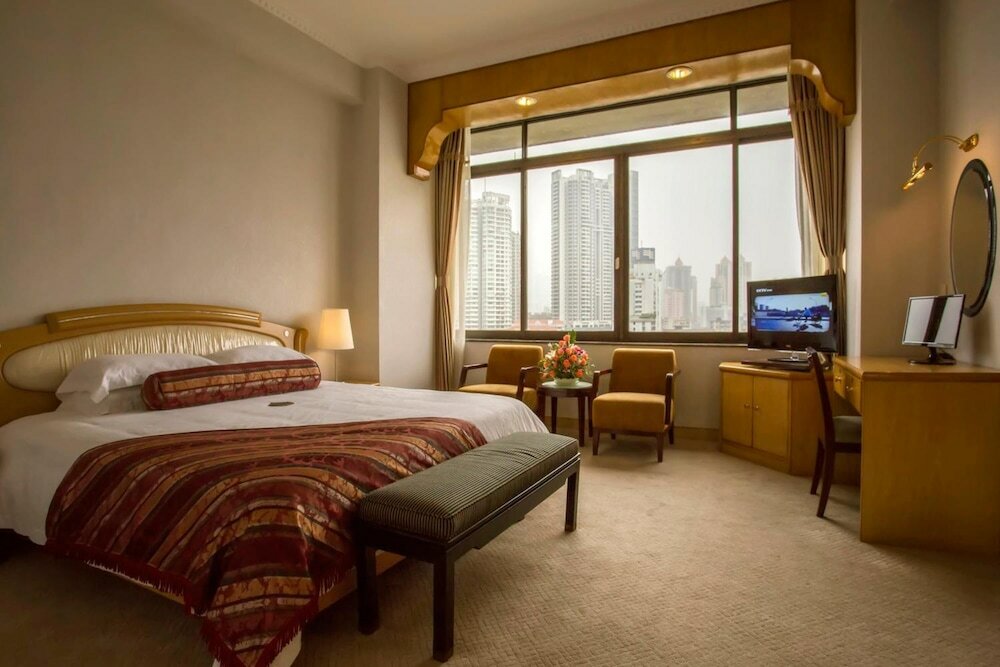 Фото Guangzhou Aiqun Hotel