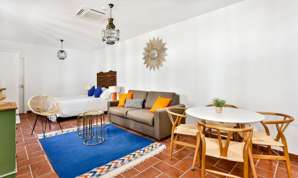 Фото Apartamentos Puerta Sevilla De Cordoba