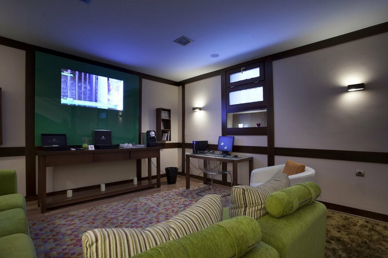 Фото Suites Gran VIA 44 Apartahotel