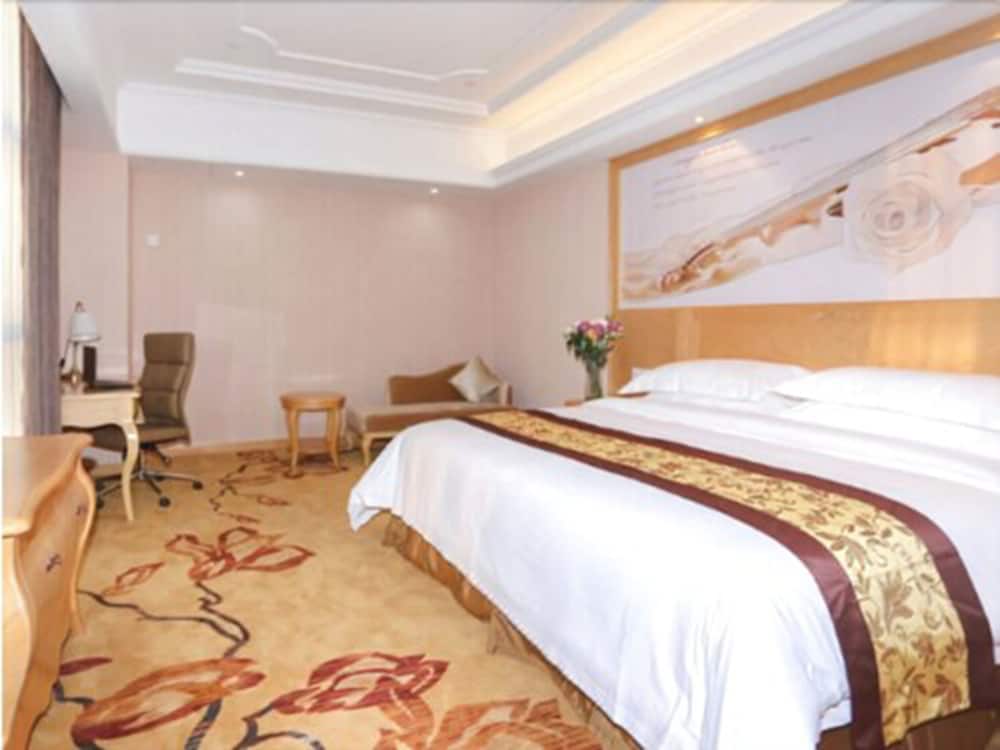 Фото Vienna International Hotel - Ningbo City West Xintiandi