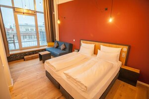 Гостиница Felix Suiten im Lebendigen Haus am Augustusplatz