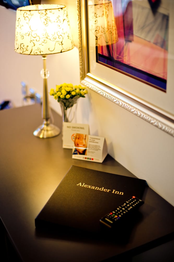 Фото Quality Suites Alexander Inn