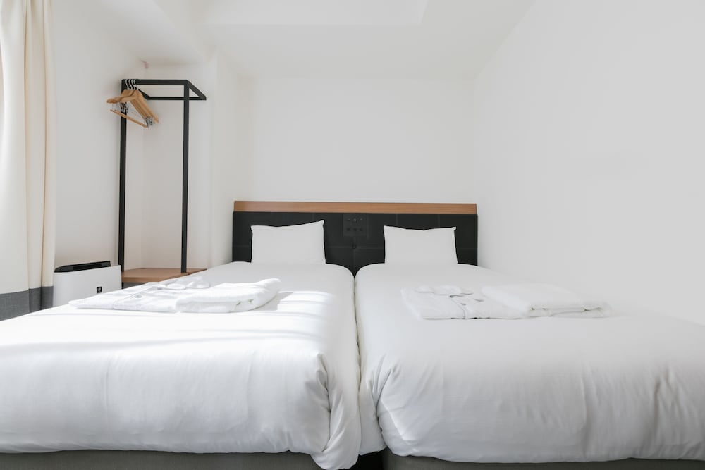 Фото Henn na Hotel Osaka Namba