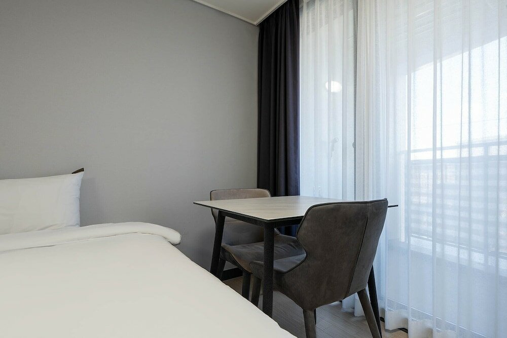 Фото Yeosu Myoungga Hotel