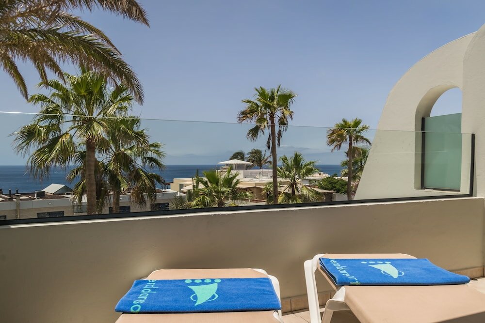 Фото Apartamentos Garden & Sea Boutique Lodging by Livvo