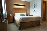 Фото Bedtime Inn & Suites