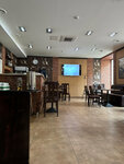 Kafe Rigo (Rimskogo-Korsakova Avenue, 45) ، مقهى