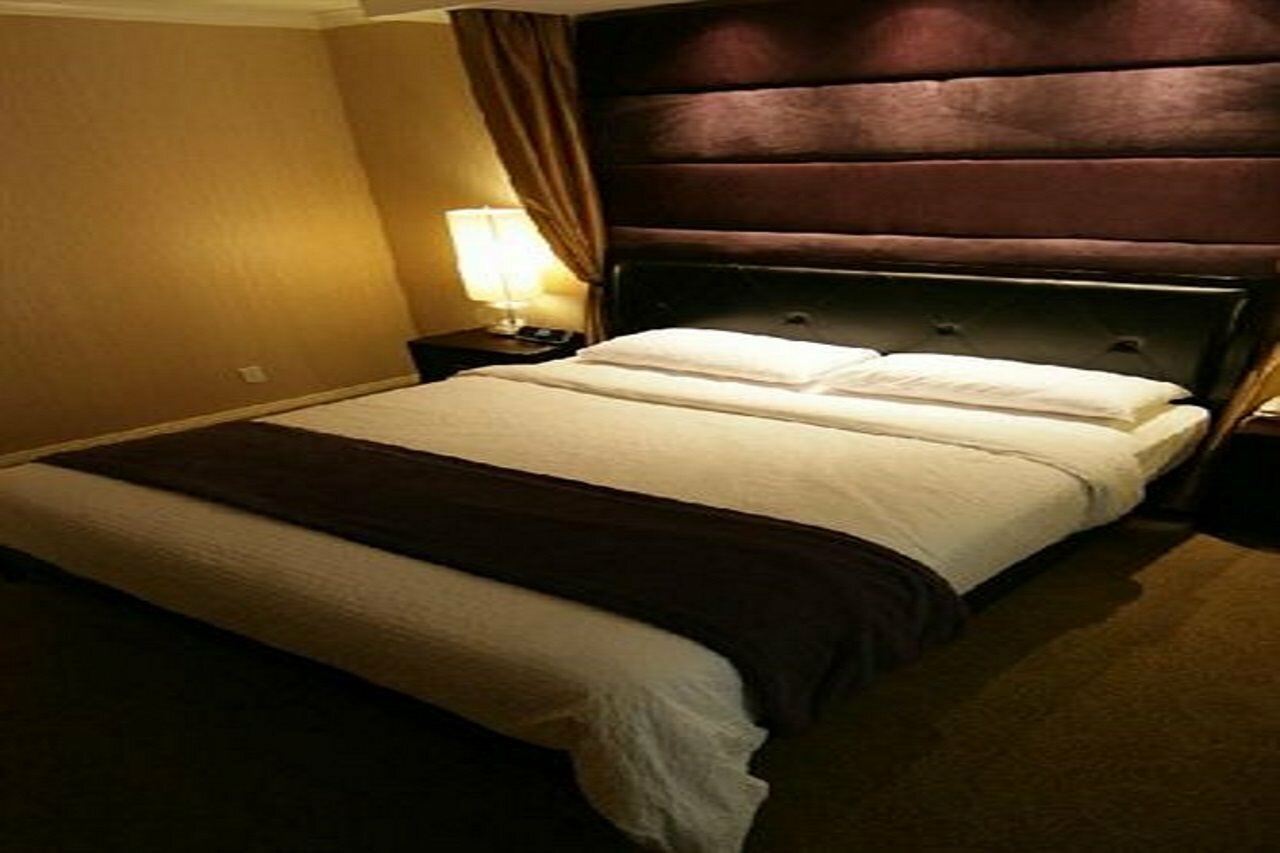 Фото Garden Suite Hotel