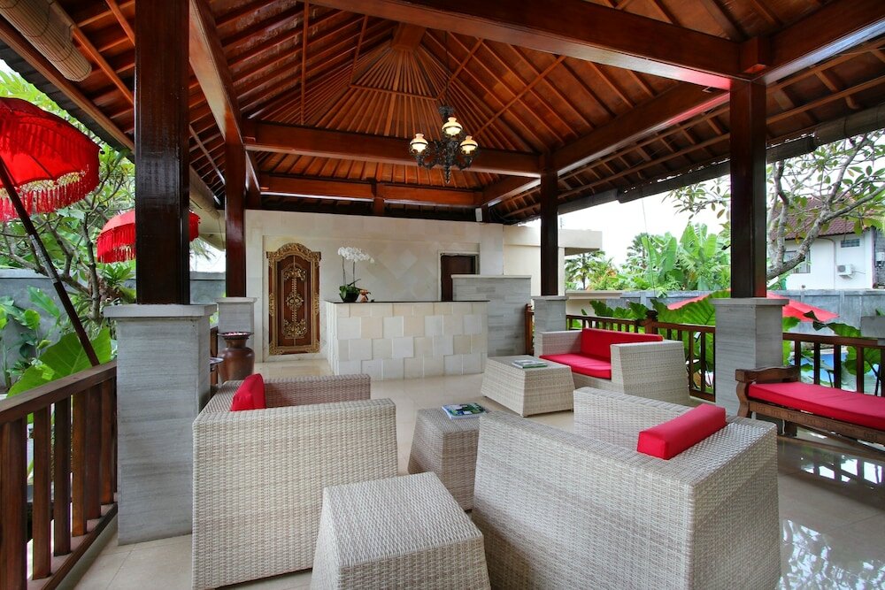 Фото Putri Ayu Cottages