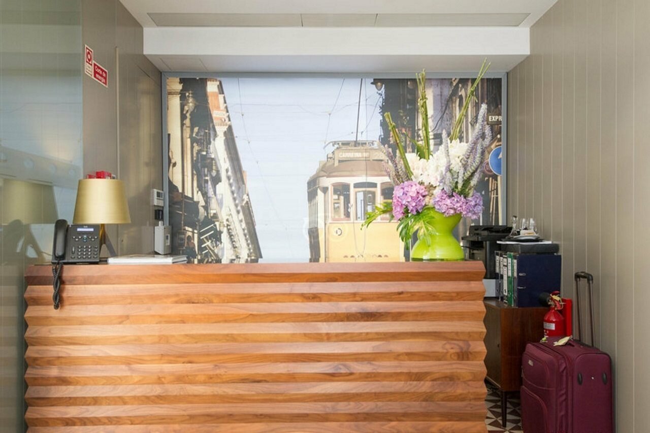 Фото Lisboa Carmo Hotel