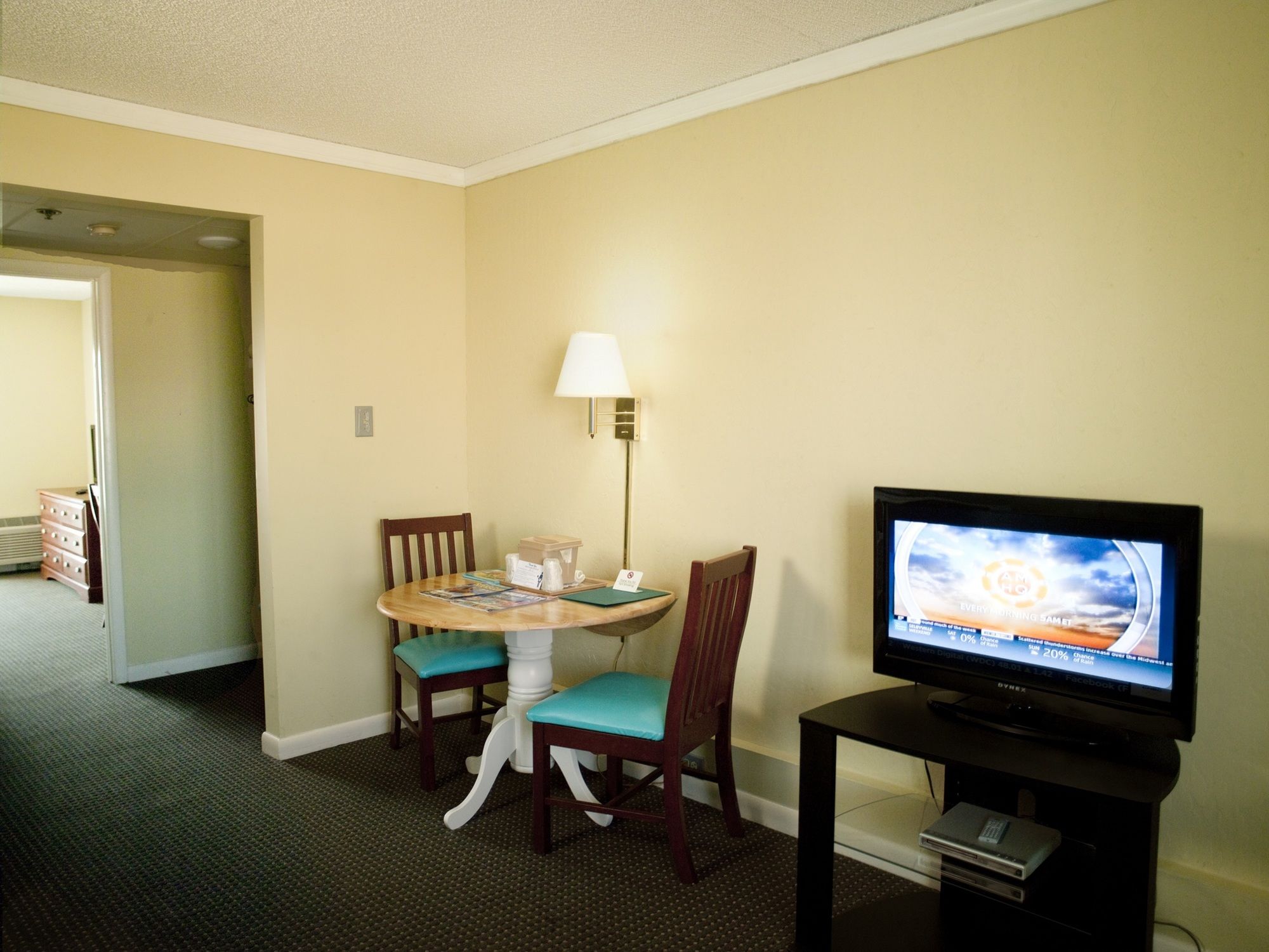 Фото Cayman Suites Hotel