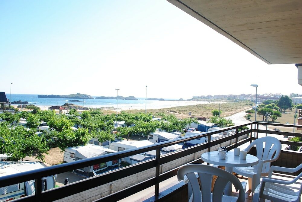 Фото Apartamentos Turisticos Suaces