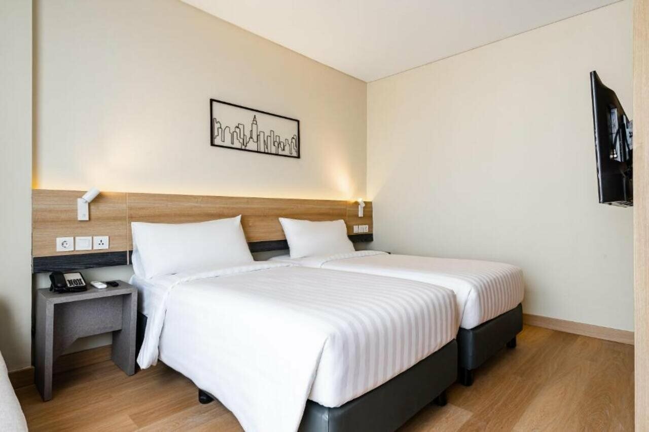 Фото Отель Quest Hotel Prime Pemuda