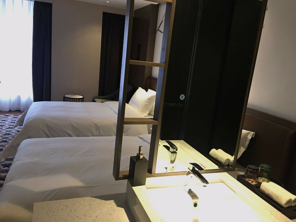 Фото Guangzhou Paco Hotel - Dongpu Teemall