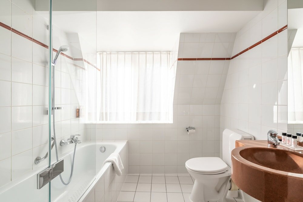 Фото Aris Grand-Place Hotel