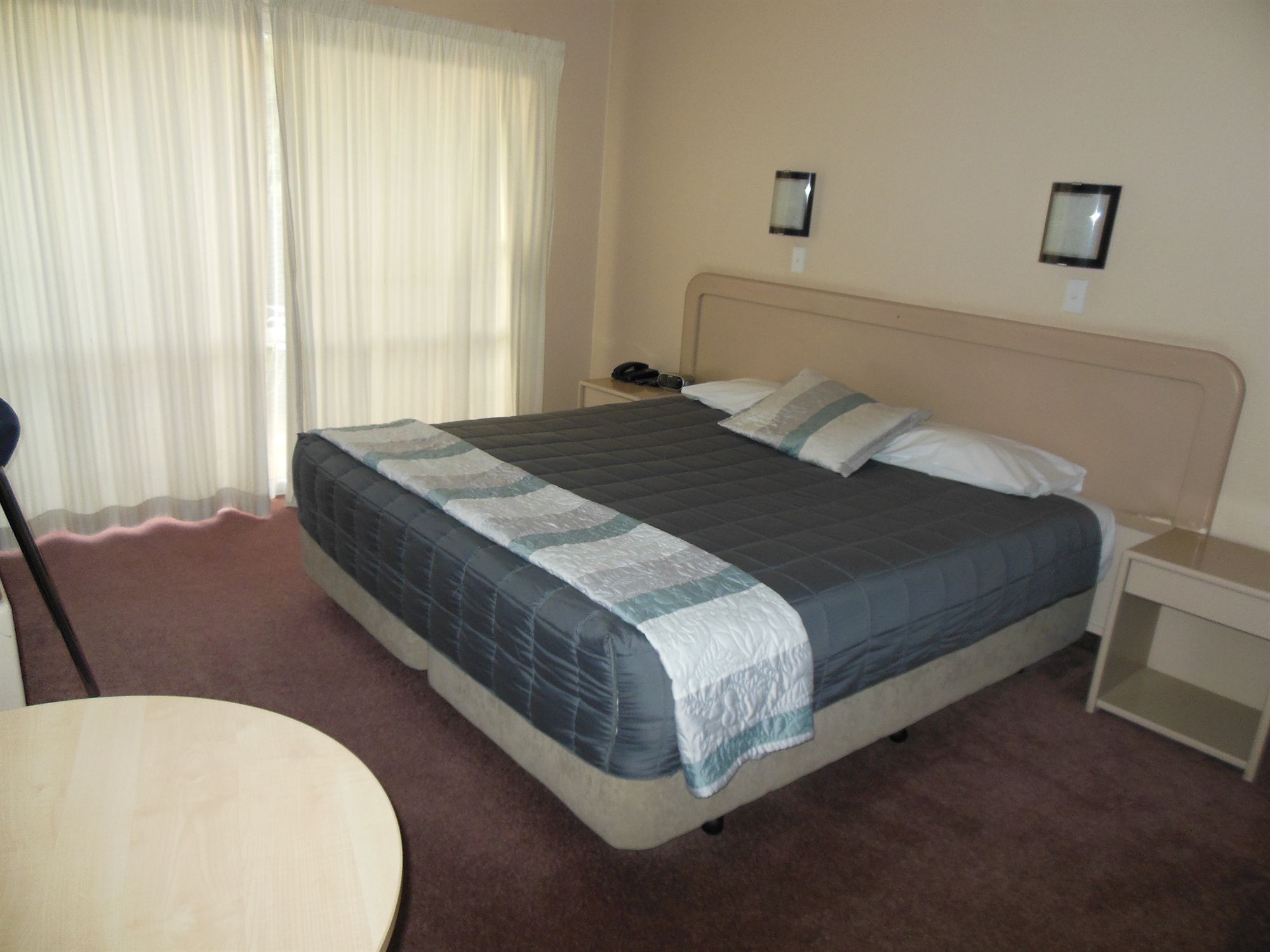 Фото Asure Camelot Arms Motor Lodge