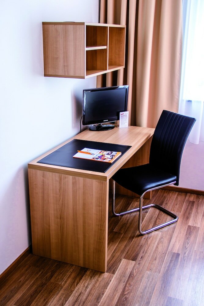 Фото Orange Hotel und Apartments