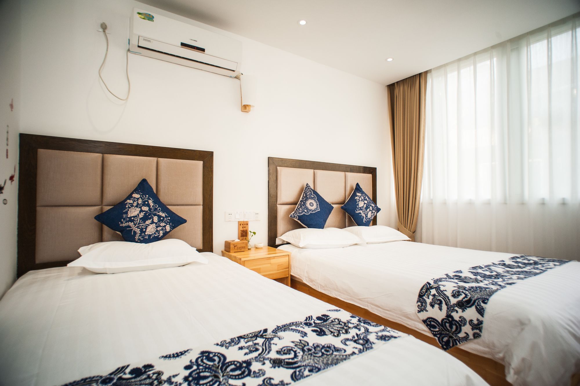 Фото Hangzhou Banmufangtang Boutique Inn