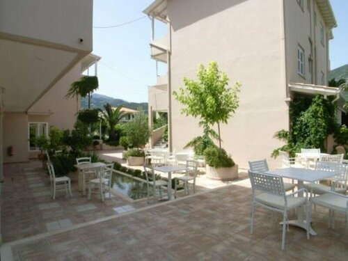 Апартаменты Happyland Hotel Apartments