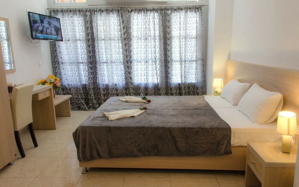 Фото Polykratis Rooms