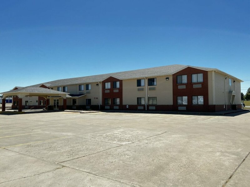 Гостиница Designer Inn & Suites
