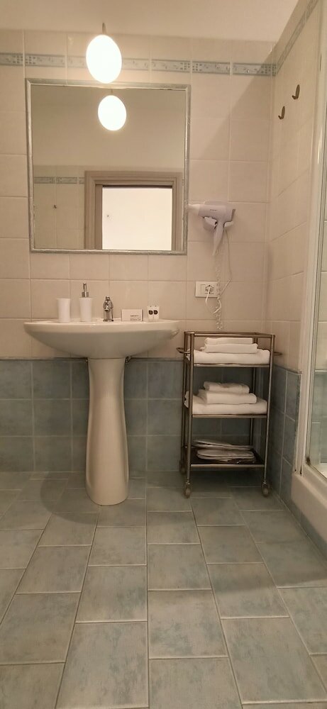 Фото Biancoreroma B&b