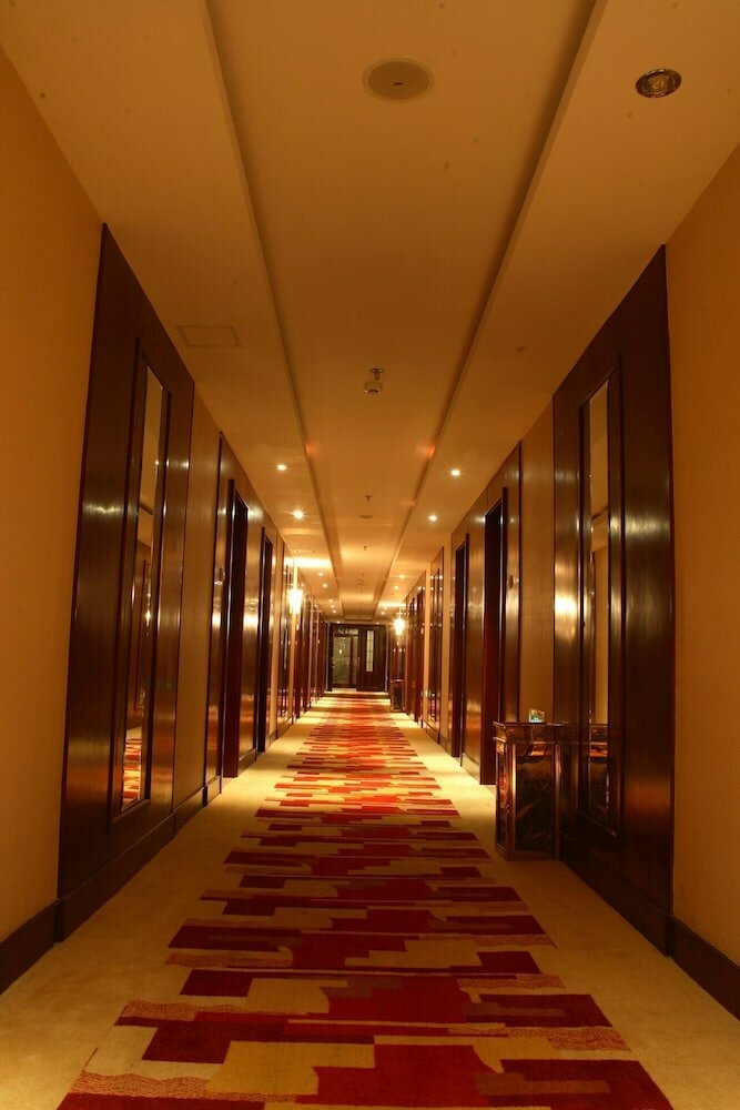 Фото Qingdao Qiulin Hotel