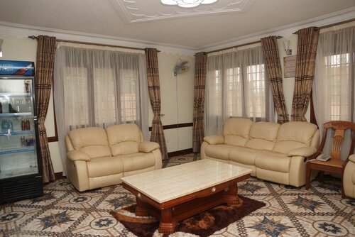 Гостиница Cosmil Executive Suites в Кампале